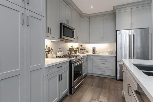 7 Karner Blue Lane, Simcoe, ON - Indoor Photo Showing Kitchen With Stainless Steel Kitchen With Double Sink With Upgraded Kitchen