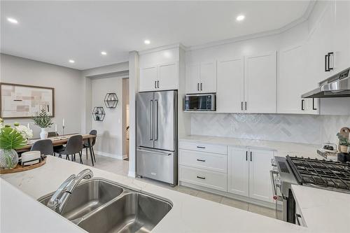 10 Beasley Grove, Hamilton, ON - Indoor Photo Showing Kitchen With Stainless Steel Kitchen With Double Sink With Upgraded Kitchen