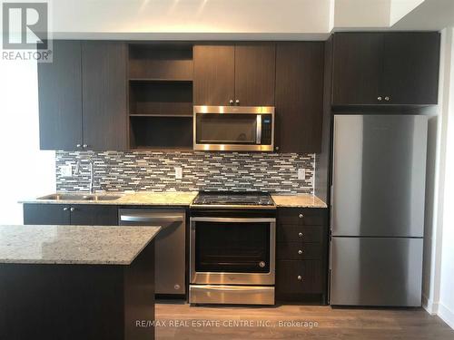 601 - 4655 Glen Erin Drive, Mississauga, ON - Indoor Photo Showing Kitchen With Upgraded Kitchen