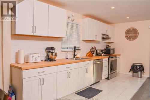 2065 Dominion, Windsor, ON - Indoor Photo Showing Kitchen With Double Sink