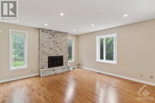 1 Burdock Grove, Ottawa, ON - Indoor Photo Showing Living Room With Fireplace