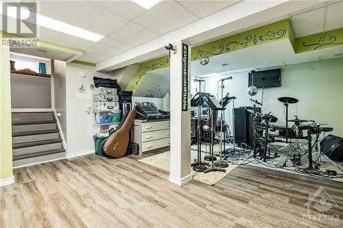 Basement Rec room with a large laundry room and another storage area with cold storage - 211 Park Avenue, Carleton Place, ON - Indoor Photo Showing Gym Room