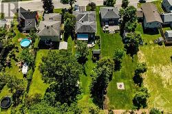 Trees line the back and side perimeter of this yard creating great privacy year round (evergreens in the back) - 