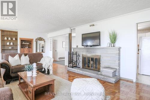 21 Glassford Road, Kawartha Lakes, ON - Indoor Photo Showing Living Room With Fireplace