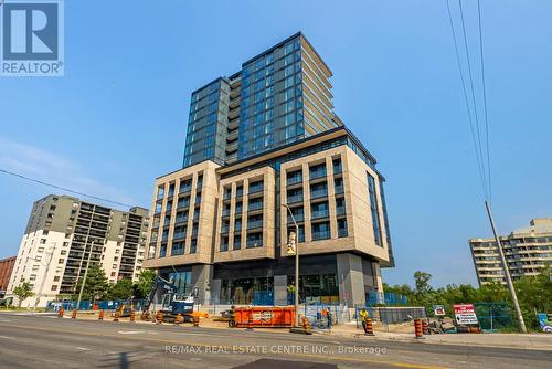 413 - 86 Dundas Street E, Mississauga, ON - Outdoor With Facade