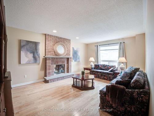 5225 Swiftcurrent Tr, Mississauga, ON - Indoor Photo Showing Living Room With Fireplace