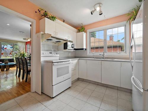 Cuisine - 430 Rue Harris, Montréal (Saint-Laurent), QC - Indoor Photo Showing Kitchen With Double Sink