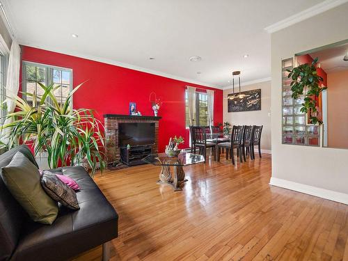 Salon - 430 Rue Harris, Montréal (Saint-Laurent), QC - Indoor Photo Showing Other Room With Fireplace