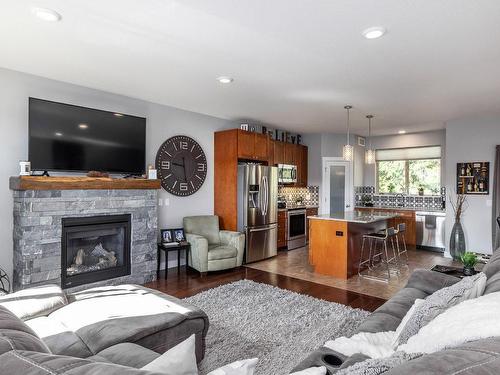 13234 Apex Crescent, Lake Country, BC - Indoor Photo Showing Living Room With Fireplace