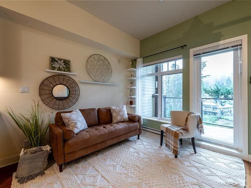 406-1375 Bear Mountain Pkwy, Langford, BC - Indoor Photo Showing Living Room