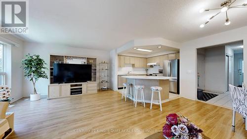 150 - 83 Mondeo Drive, Toronto, ON - Indoor Photo Showing Living Room