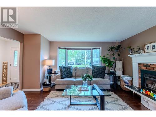 2982 Berwick Drive, Prince George, BC - Indoor Photo Showing Living Room With Fireplace