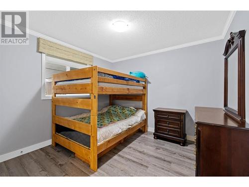 9020 Jim Bailey Road Unit# 33A, Kelowna, BC - Indoor Photo Showing Bedroom