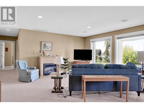 1625 Merlot Drive, West Kelowna, BC - Indoor Photo Showing Living Room With Fireplace