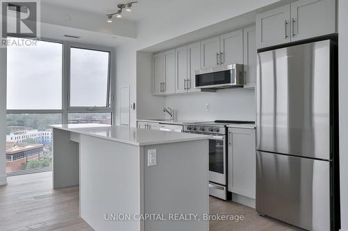 1104 - 1063 Douglas Mccurdy Comm Circle, Mississauga, ON - Indoor Photo Showing Kitchen With Stainless Steel Kitchen