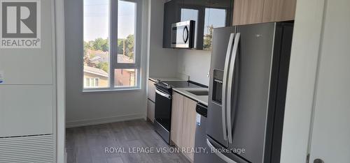 309 - 3100 Keele Street, Toronto (Downsview-Roding-Cfb), ON - Indoor Photo Showing Kitchen