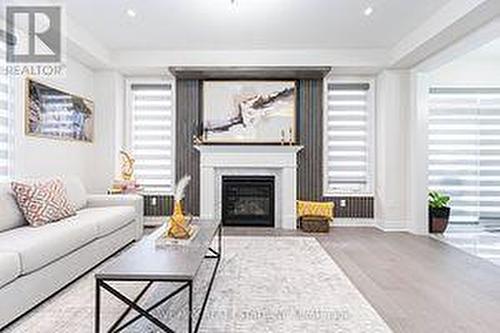 3 Grierson Trail, Hamilton, ON - Indoor Photo Showing Living Room With Fireplace