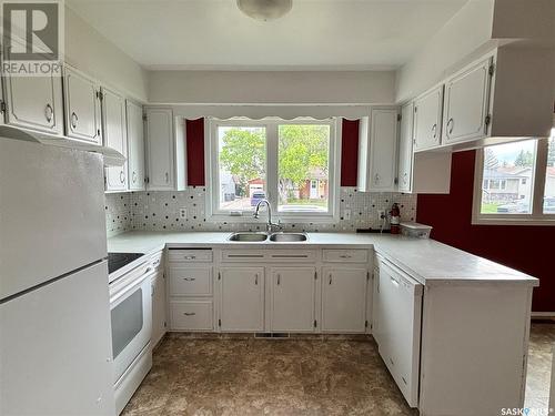 68 Folley Crescent, Lanigan, SK - Indoor Photo Showing Kitchen With Double Sink