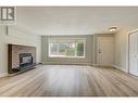 4333 Lakeshore Road, Kelowna, BC  - Indoor Photo Showing Living Room With Fireplace 