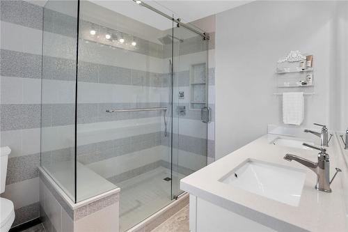 And luxury 4-piece ensuite with glass shower... - 39 Sumner Crescent, Grimsby, ON - Indoor Photo Showing Bathroom