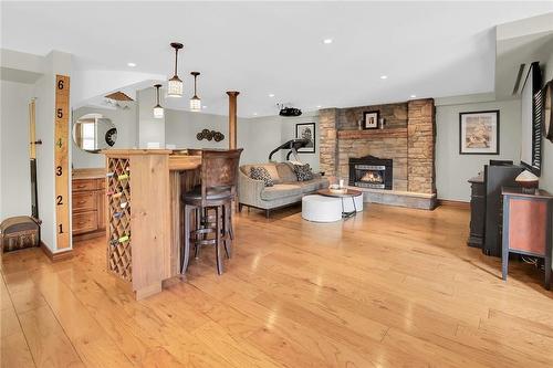 Great rec room with fireplace and wet bar - 39 Sumner Crescent, Grimsby, ON - Indoor Photo Showing Living Room With Fireplace