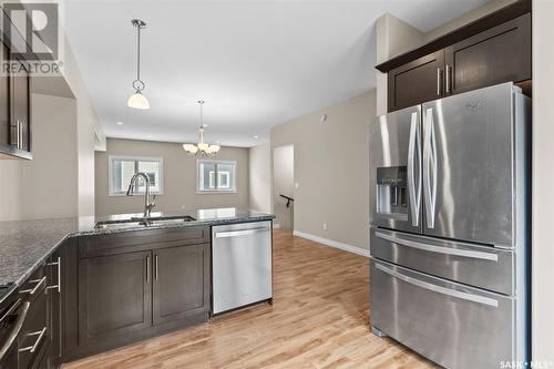 308 212 Willis Crescent, Saskatoon, SK - Indoor Photo Showing Kitchen With Upgraded Kitchen