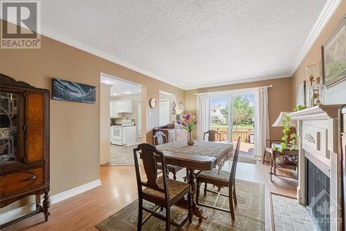 1585 Montcerf Court, Ottawa, ON - Indoor Photo Showing Dining Room With Fireplace