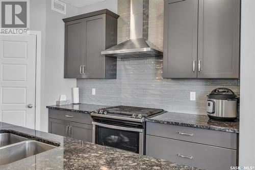 1018 Childers Court, Saskatoon, SK - Indoor Photo Showing Kitchen With Double Sink With Upgraded Kitchen