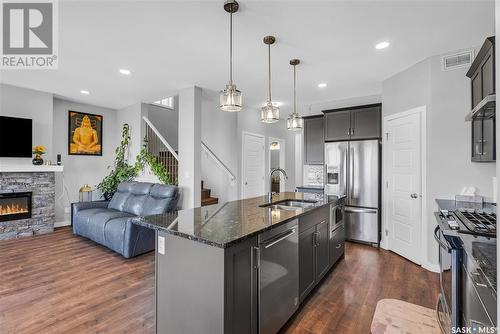 1018 Childers Court, Saskatoon, SK - Indoor Photo Showing Kitchen With Double Sink With Upgraded Kitchen