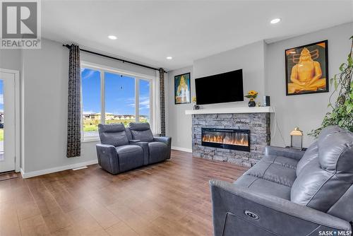 1018 Childers Court, Saskatoon, SK - Indoor Photo Showing Living Room With Fireplace