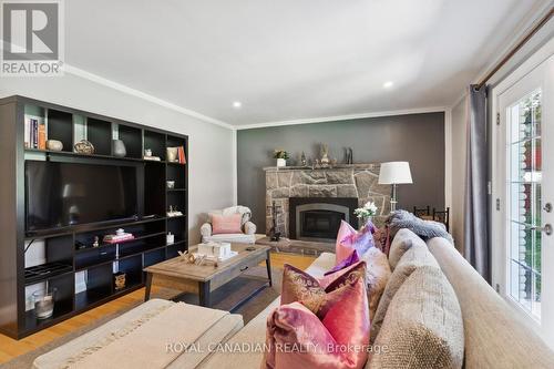 1012 Mill Street, Muskoka Lakes, ON - Indoor Photo Showing Living Room With Fireplace