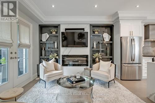 4 - 2071 Ghent Avenue, Burlington, ON - Indoor Photo Showing Living Room With Fireplace