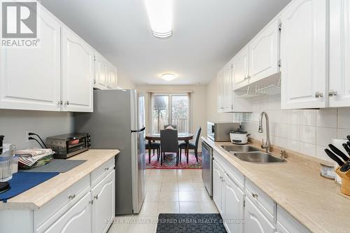 2462 Grindstone Court, Mississauga, ON - Indoor Photo Showing Kitchen With Double Sink