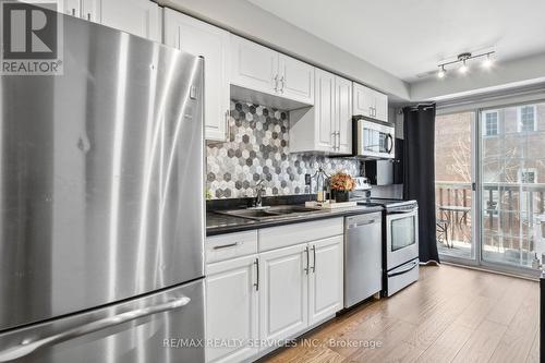 79 - 6950 Tenth Line, Mississauga, ON - Indoor Photo Showing Kitchen With Double Sink