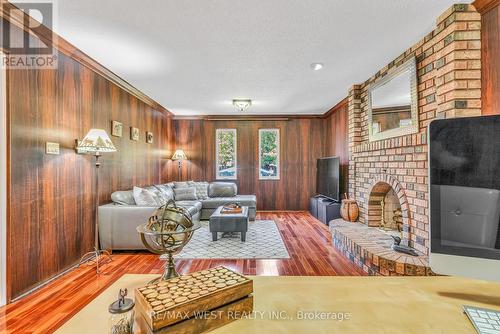 4 Neiltree Court, Toronto, ON - Indoor Photo Showing Living Room With Fireplace