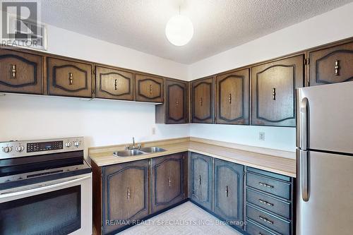 605 - 355 Rathburn Road E, Mississauga, ON - Indoor Photo Showing Kitchen With Double Sink