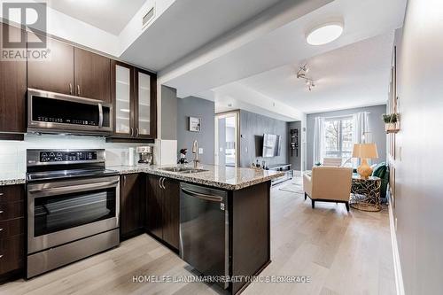 205 - 57 Upper Duke Crescent, Markham, ON - Indoor Photo Showing Kitchen With Double Sink With Upgraded Kitchen