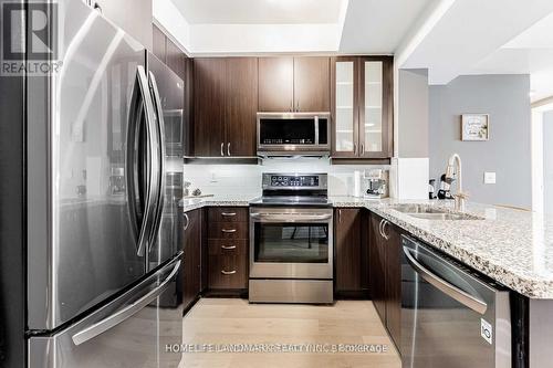 205 - 57 Upper Duke Crescent, Markham, ON - Indoor Photo Showing Kitchen With Stainless Steel Kitchen With Double Sink