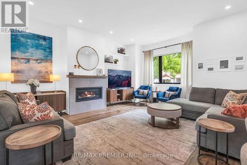 4 Bertha Avenue, Toronto (Clairlea-Birchmount), ON - Indoor Photo Showing Living Room With Fireplace