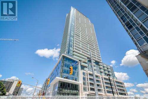 2803 - 8 Olympic Garden Drive, Toronto, ON - Outdoor With Facade