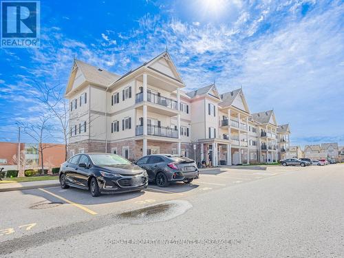 104 - 1 Sidney Lane, Clarington, ON - Outdoor With Balcony With Facade