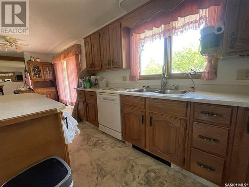 303 21 Highway S, Maple Creek, SK - Indoor Photo Showing Kitchen With Double Sink