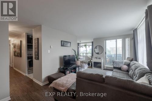 802 - 76 Base Line Road W, London, ON - Indoor Photo Showing Living Room With Fireplace