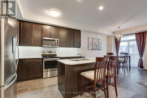 115 - 1960 Dalmagarry Road, London, ON - Indoor Photo Showing Kitchen With Stainless Steel Kitchen With Double Sink