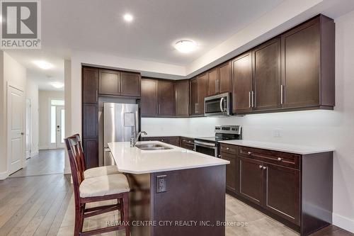 115 - 1960 Dalmagarry Road, London, ON - Indoor Photo Showing Kitchen With Stainless Steel Kitchen With Double Sink