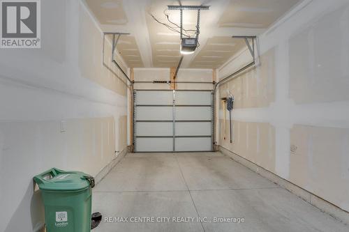 115 - 1960 Dalmagarry Road, London, ON - Indoor Photo Showing Garage