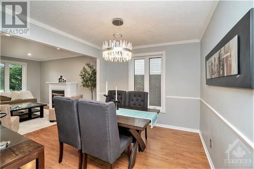 180 Equestrian Drive, Kanata, ON - Indoor Photo Showing Dining Room With Fireplace