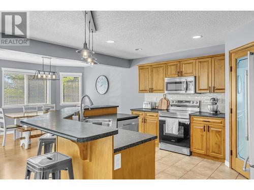 6340 Driftwood Place, Prince George, BC - Indoor Photo Showing Kitchen With Double Sink