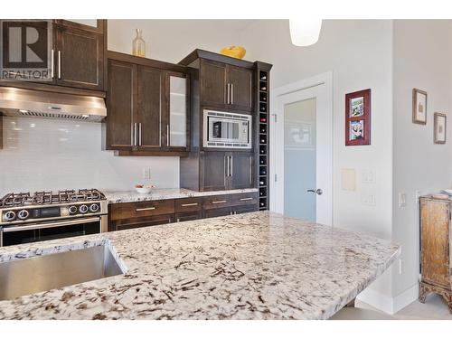 569 Harrogate Lane, Kelowna, BC - Indoor Photo Showing Kitchen With Stainless Steel Kitchen With Upgraded Kitchen