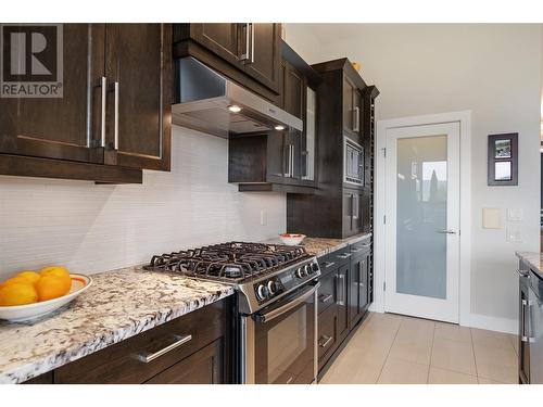 569 Harrogate Lane, Kelowna, BC - Indoor Photo Showing Kitchen With Upgraded Kitchen